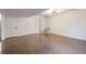 Spacious basement area with hardwood floors, closet and recessed lighting at 6581 E Heritage Pl, Englewood, CO 80111