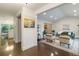 Open concept living room with stylish decor and hardwood floors at 6581 E Heritage Pl, Englewood, CO 80111