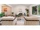 Bright living room features stylish furniture, hardwood floors and a bay window at 6581 E Heritage Pl, Englewood, CO 80111