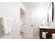 Bright bathroom featuring sleek fixtures and a modern vanity with gold hardware at 1024 Stuart St, Denver, CO 80204