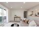 Bright living room showing open access to the sliding door patio and kitchen at 1024 Stuart St, Denver, CO 80204