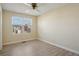 Bedroom with a window and ceiling fan at 176 S Pembrook St, Castle Rock, CO 80104