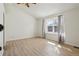 Bedroom featuring a window with curtains and ceiling fan at 176 S Pembrook St, Castle Rock, CO 80104