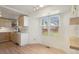 Bright dining area with a large window overlooking the backyard at 176 S Pembrook St, Castle Rock, CO 80104