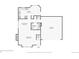 Detailed floor plan showing the layout of the kitchen, living room, dining room, bathroom, laundry, and garage at 176 S Pembrook St, Castle Rock, CO 80104