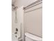 Clean and modern bathroom featuring a shower with white tile and updated showerhead at 19481 E Milan Cir, Aurora, CO 80013