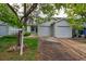 Charming single-Gathering home featuring a two-car garage, beautiful landscaping, and mature trees in a quiet neighborhood at 11149 Gaylord St, Northglenn, CO 80233