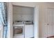 Convenient laundry closet equipped with a modern washer and dryer unit at 11149 Gaylord St, Northglenn, CO 80233