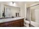 Clean bathroom with shower/tub combo, vanity, and toilet at 4343 S Nepal Ct, Centennial, CO 80015