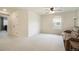 Relaxing bedroom with large window and plush brown couch at 4343 S Nepal Ct, Centennial, CO 80015