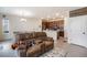 Kitchen and dining area with an island and hardwood floors at 4343 S Nepal Ct, Centennial, CO 80015