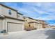 Row of townhouses with attached garages and landscaping at 4343 S Nepal Ct, Centennial, CO 80015