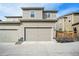 Attached two-car garage with driveway at 4343 S Nepal Ct, Centennial, CO 80015