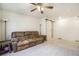 Relaxing sitting area with a brown reclining couch at 4343 S Nepal Ct, Centennial, CO 80015