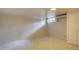 Basement room features carpet and a window, perfect for storage or future living space at 782 Holly St, Denver, CO 80220