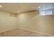 Bedroom with neutral walls, a window, and a carpeted floor at 782 Holly St, Denver, CO 80220
