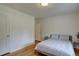 Bright bedroom with hardwood floors and a neutral color palette at 782 Holly St, Denver, CO 80220