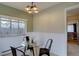 Charming breakfast nook with natural light and a modern light fixture at 782 Holly St, Denver, CO 80220