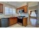 Updated kitchen featuring granite countertops and stainless steel appliances at 782 Holly St, Denver, CO 80220