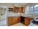 Well-maintained kitchen with stainless steel appliances, granite counters and wooden cabinets at 782 Holly St, Denver, CO 80220