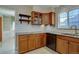 Updated kitchen featuring granite countertops and stainless steel appliances at 782 Holly St, Denver, CO 80220