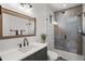Stylish bathroom featuring a vessel sink, dark wood accents and a glass enclosed shower at 15191 Dinosaur Ridge Rd, Morrison, CO 80465