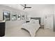Bright bedroom with modern furnishings, a large window and plush carpeting at 15191 Dinosaur Ridge Rd, Morrison, CO 80465