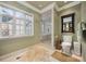 Bathroom featuring a walk-in shower and neutral-toned walls and floors at 5530 E 6Th Ave Pkwy, Denver, CO 80220