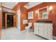 Stylish bathroom with a sauna, marble floors, and updated fixtures, creating a spa-like experience at 5530 E 6Th Ave Pkwy, Denver, CO 80220