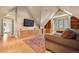 Bonus room with built-in storage, shelving, and skylights at 5530 E 6Th Ave Pkwy, Denver, CO 80220