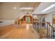 Spacious bonus room with skylights and built-in shelving and seating at 5530 E 6Th Ave Pkwy, Denver, CO 80220