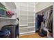 Spacious closet with built-in shelving and ample hanging space, ideal for organization at 5530 E 6Th Ave Pkwy, Denver, CO 80220