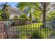 Beautiful landscaping and mature shade trees around the house at 5530 E 6Th Ave Pkwy, Denver, CO 80220