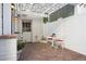 Enclosed patio with brick flooring, a pergola, and outdoor seating, perfect for relaxing or entertaining guests at 5530 E 6Th Ave Pkwy, Denver, CO 80220