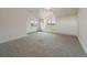 Bedroom with a window seat and neutral carpet providing natural light at 5939 Lone Peak Dr, Evergreen, CO 80439