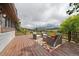 Deck with comfortable seating and scenic mountain views at 5939 Lone Peak Dr, Evergreen, CO 80439