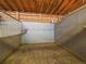 Interior view of a horse stall with metal dividers and ample space at 5939 Lone Peak Dr, Evergreen, CO 80439