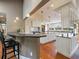 Open concept kitchen features a large island and mountain views at 5939 Lone Peak Dr, Evergreen, CO 80439
