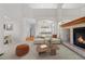 Bright and airy living room with modern decor and a fireplace at 4069 S Abilene Cir # E, Aurora, CO 80014