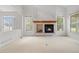Cozy living room featuring a fireplace at 4069 S Abilene Cir # E, Aurora, CO 80014