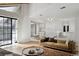 Spacious living room featuring hardwood floors, open layout, and tons of light at 12622 E Warren Dr # E, Aurora, CO 80014