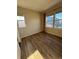 An inviting bedroom featuring lots of light and sleek hardwood floors at 7414 E 28Th Ave # 4, Denver, CO 80238