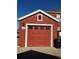 Garage featuring paneled door at 7414 E 28Th Ave # 4, Denver, CO 80238