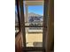 View from open front door onto welcoming patio area of neighborhood home at 7414 E 28Th Ave # 4, Denver, CO 80238
