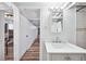 Clean basement bathroom with shower/tub, vanity, and updated fixtures at 1331 N Ogden St # 1, Denver, CO 80218