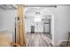 Clean and efficient basement kitchen with white cabinets at 1331 N Ogden St # 1, Denver, CO 80218