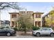 Charming two-story duplex with a classic facade and well-maintained landscaping at 1331 N Ogden St # 1, Denver, CO 80218