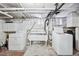 Basement laundry area with washer, dryer, and utility sink at 1331 N Ogden St # 1, Denver, CO 80218