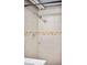 Basement shower stall with tiled walls and modern shower head at 1331 N Ogden St # 1, Denver, CO 80218