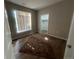 Bright bedroom featuring hardwood floors, natural light, and a walk-in closet at 14400 Albrook Dr # 88, Denver, CO 80239